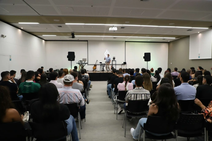 People attend a presentation in a conference hall